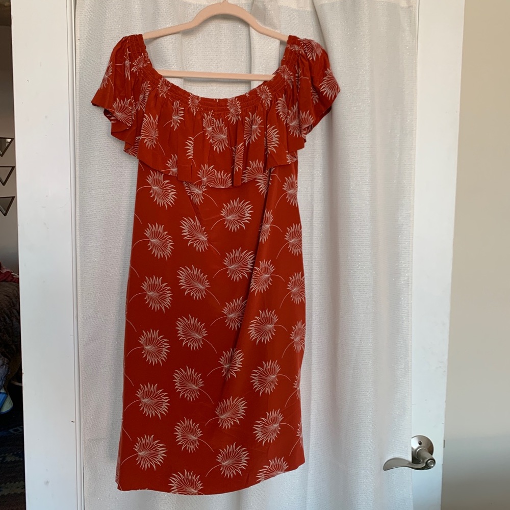 Flower print off the should dress.